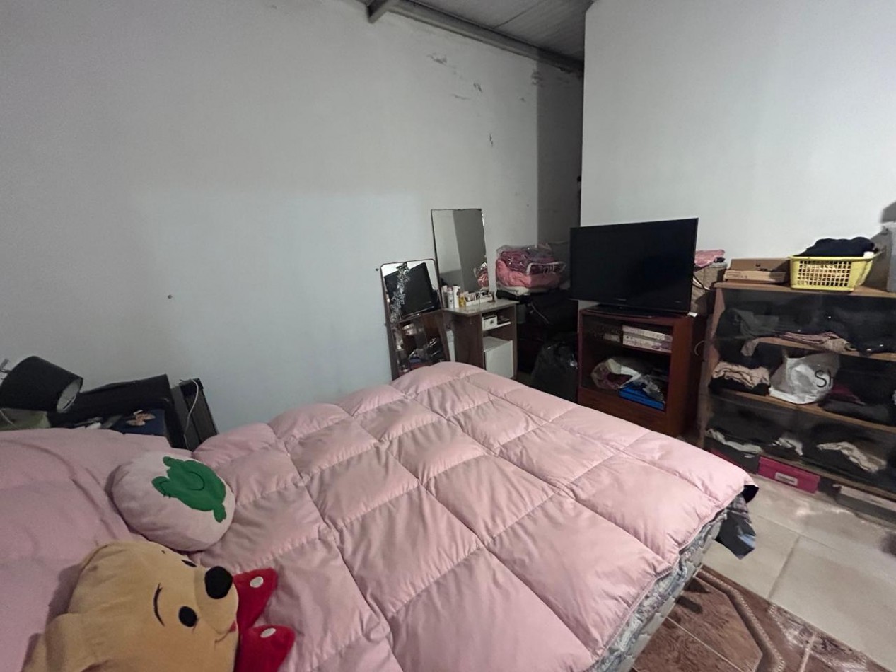 Parque Habitacional Ibarlucea, casa dos dormitorios con patio amplio, terreno de 300 m2