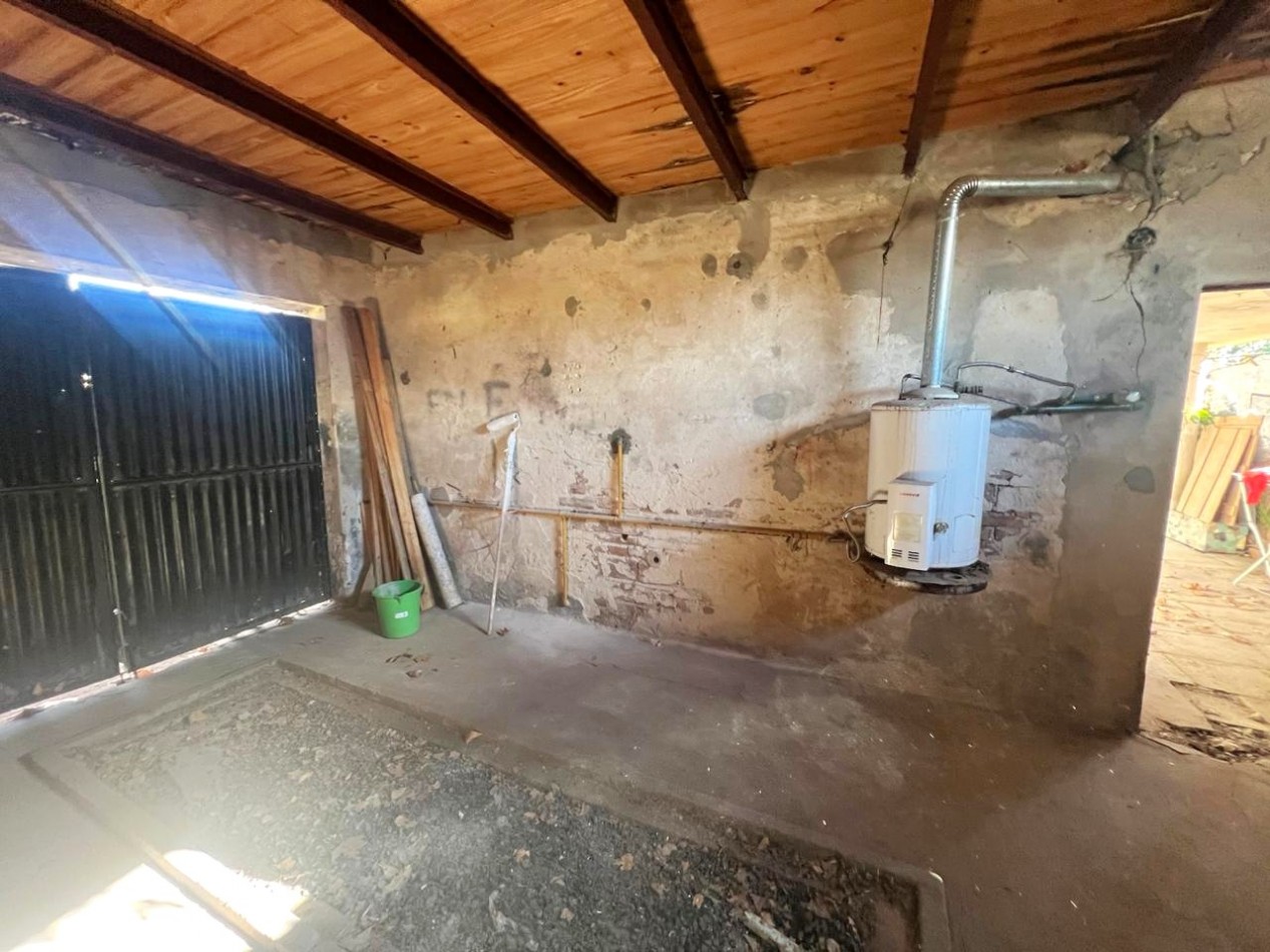 Baigorria, casa dos dormitorios, cochera. Saenz 300